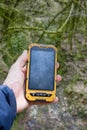 smartphone tracking travel on mountain trails. Royalty Free Stock Photo