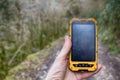 smartphone tracking travel on mountain trails. Royalty Free Stock Photo