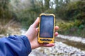 smartphone tracking travel on mountain trails. Royalty Free Stock Photo