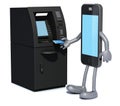 Smartphone that is using an ATM Royalty Free Stock Photo