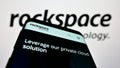 Smartphone with webpage of US data center company Rackspace Technology Inc. on screen in front of logo. Royalty Free Stock Photo