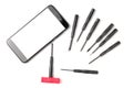 A smartphone with a white screen and a set of tools for repairing complex equipment. Flat lay, top view, copy space Royalty Free Stock Photo
