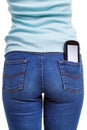 Smartphone in womans rear pocket