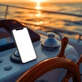Smartphone on Yacht Deck at Sunset with Blank Screen Royalty Free Stock Photo