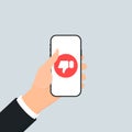 Smartphone in your hand concept. Dislike Royalty Free Stock Photo