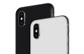 Close up black and white rotated smartphone similar to iPhone X back sides with camera modules cropped