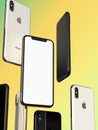 IPhone XS Gold, Silver and Space Grey smartphones, floating in air, white screen