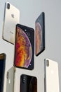 IPhone XS Gold, Silver and Space Grey smartphones, floating