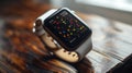 Smartwatch Displaying Time and Colorful Constellation Pattern on Wooden Surface Royalty Free Stock Photo