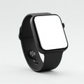 Smartwatch with a square face and black band on a light gray background. The display Royalty Free Stock Photo