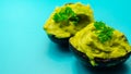 Smashed avocado, smother avocado with lemon juice served on the for brunch