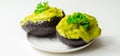 Smashed avocado, smother avocado with lemon juice served on the for brunch