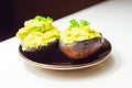 Smashed avocado, smother avocado with lemon juice served on the for brunch