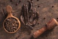 Carob pods on wood