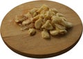 Smashed Garlic on Round Cutting Board - Isolated Royalty Free Stock Photo