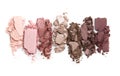 A smashed, neutral toned eyeshadow make up palette isolated on a white background Royalty Free Stock Photo