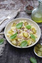 Smashed potato salad with pickles, red onion, basil and olive oil Royalty Free Stock Photo