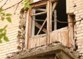 smashed a shot of an old brick building balcony at the Donbass in Ukraine