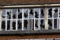 Smashed Windows in the Derelict Unigate Factory, Great Torrington, Devon, England.