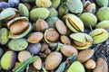 Smashing almond with stone, pouring almonds, eating almonds is good for health, natural almonds, dry almond seeds