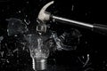 Smashing a light bulb Royalty Free Stock Photo