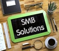 SMB Solutions on Small Chalkboard. 3D Render.