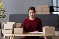 SME business entrepreneurs small in asia Preparing cardboard boxes in home office Small business operators preparing to Royalty Free Stock Photo