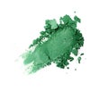 Smear of crushed green eyeshadow as sample of cosmetic product Royalty Free Stock Photo