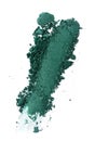 Smear of crushed green eyeshadow as sample of cosmetic product Royalty Free Stock Photo