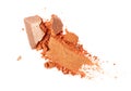 Smear of crushed orange eyeshadow as sample of cosmetic product Royalty Free Stock Photo