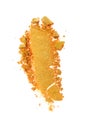 Smear of crushed orange eyeshadow as sample of cosmetic product Royalty Free Stock Photo