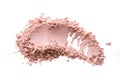 Smear from dry pink cosmetic clay. Texture of makeup powder - blush or eyeshadow. Isolated on a white