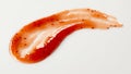 Smeared blob of spicy jam sauce on white