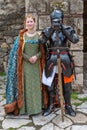 Medieval knight with Mail Armour and Sword with his Lady.