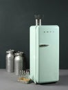 Smeg domestic fridge and bottles Royalty Free Stock Photo