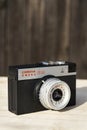 Smena 8M old vintage filtered camera on wooden background