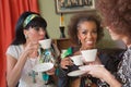 Smiilng Mature Women Having Tea Royalty Free Stock Photo