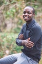 Smile african business man in green nature background Royalty Free Stock Photo