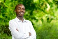 Smile african portrait man in green nature background Royalty Free Stock Photo