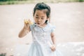 Smile asian baby girl play bubble balloon Royalty Free Stock Photo