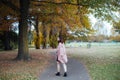 Asian female in autumn nature Royalty Free Stock Photo