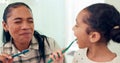 Smile, brushing teeth and mother with daughter, morning routine and child development in bathroom. Happy family or mama Royalty Free Stock Photo