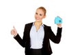 Smile business woman holding a paper house Royalty Free Stock Photo