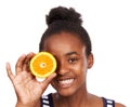 Smile, child and cover with girl with orange in studio for nutrition, wellness and diet. Food, self care and vitamin c