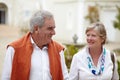 Smile, conversation and a senior couple in the city for a retirement holiday, travel and happiness. Happy, love and an Royalty Free Stock Photo