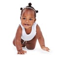 Smile, crawl and African girl baby isolated on white background with playful happiness and growth. Learning, playing and