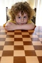 Smile Curly Boy & Chess Royalty Free Stock Photo