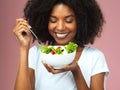 Smile, eating and woman with salad for wellness, fresh and detox lunch meal with vegetables. Happy, healthy and female Royalty Free Stock Photo