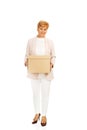 Smile elderly business woman holding cardboard box Royalty Free Stock Photo