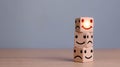 Smile face in bright side and sad face in dark side on wooden block cube for positive mindset selection concept Royalty Free Stock Photo